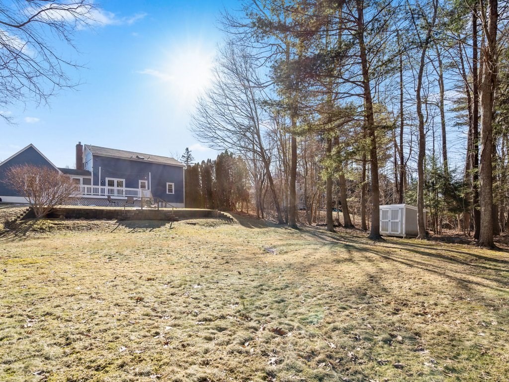 62 Middle Road Amesbury, MA 01913 - Photo 24 of 24 a swimming pool with outdoor seating and yard