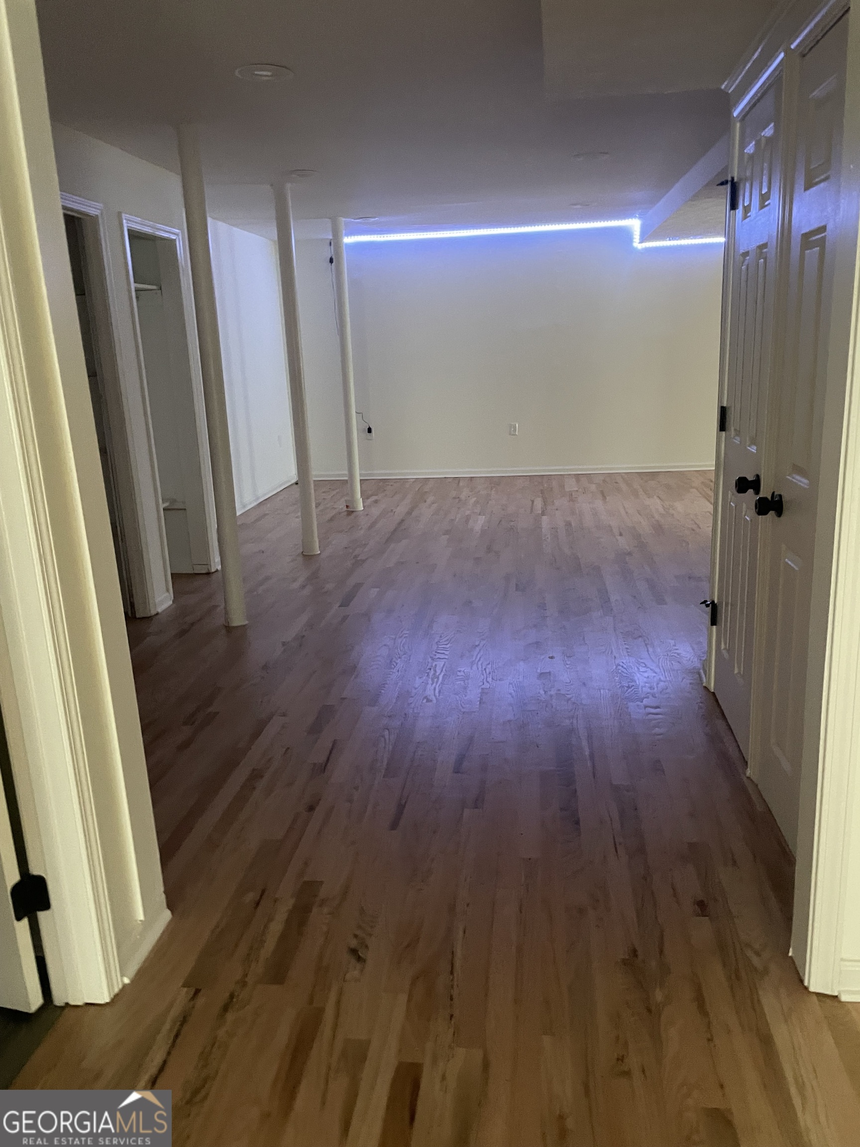 5205 Corinth Circle, Unit 3 Stone Mountain, GA 30087 - Photo 11 of 22 wooden floor in an empty room