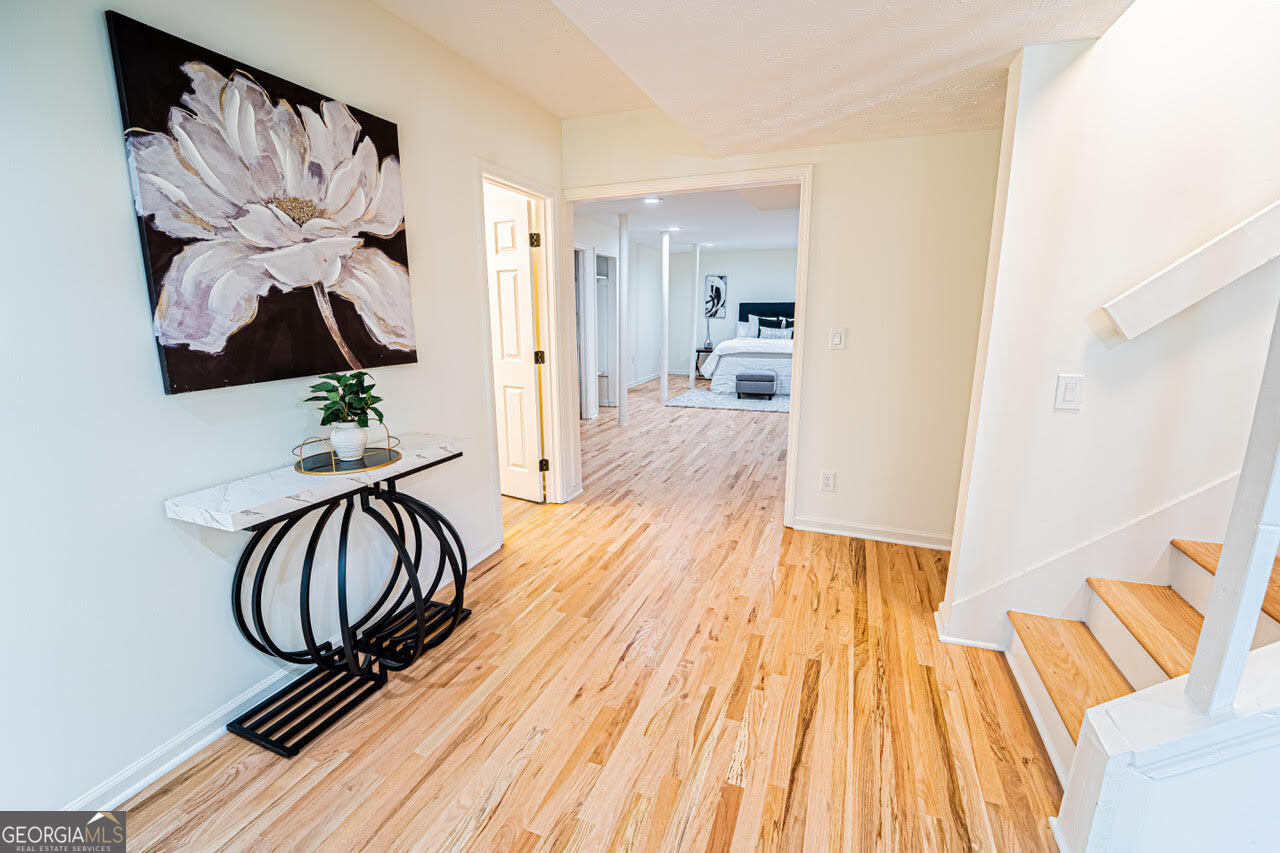 5205 Corinth Circle, Unit 3 Stone Mountain, GA 30087 - Photo 3 of 22 a view of an entryway with wooden floor