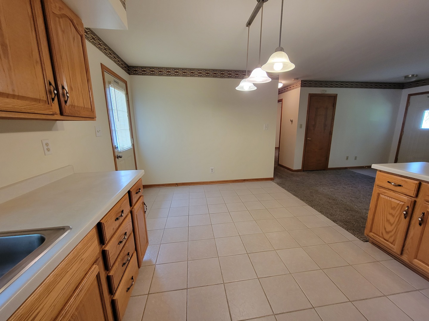 208 Nebraska Street, Unit A Ottawa, IL 61350 - Photo 10 of 14 a view of a kitchen with a sink