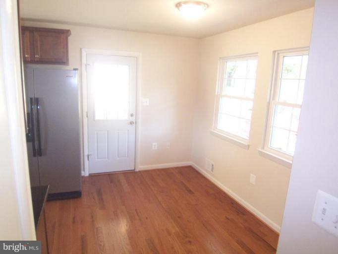7909 Hart Road Fort Washington, MD 20744 - Photo 4 of 21 an empty room with windows and closet