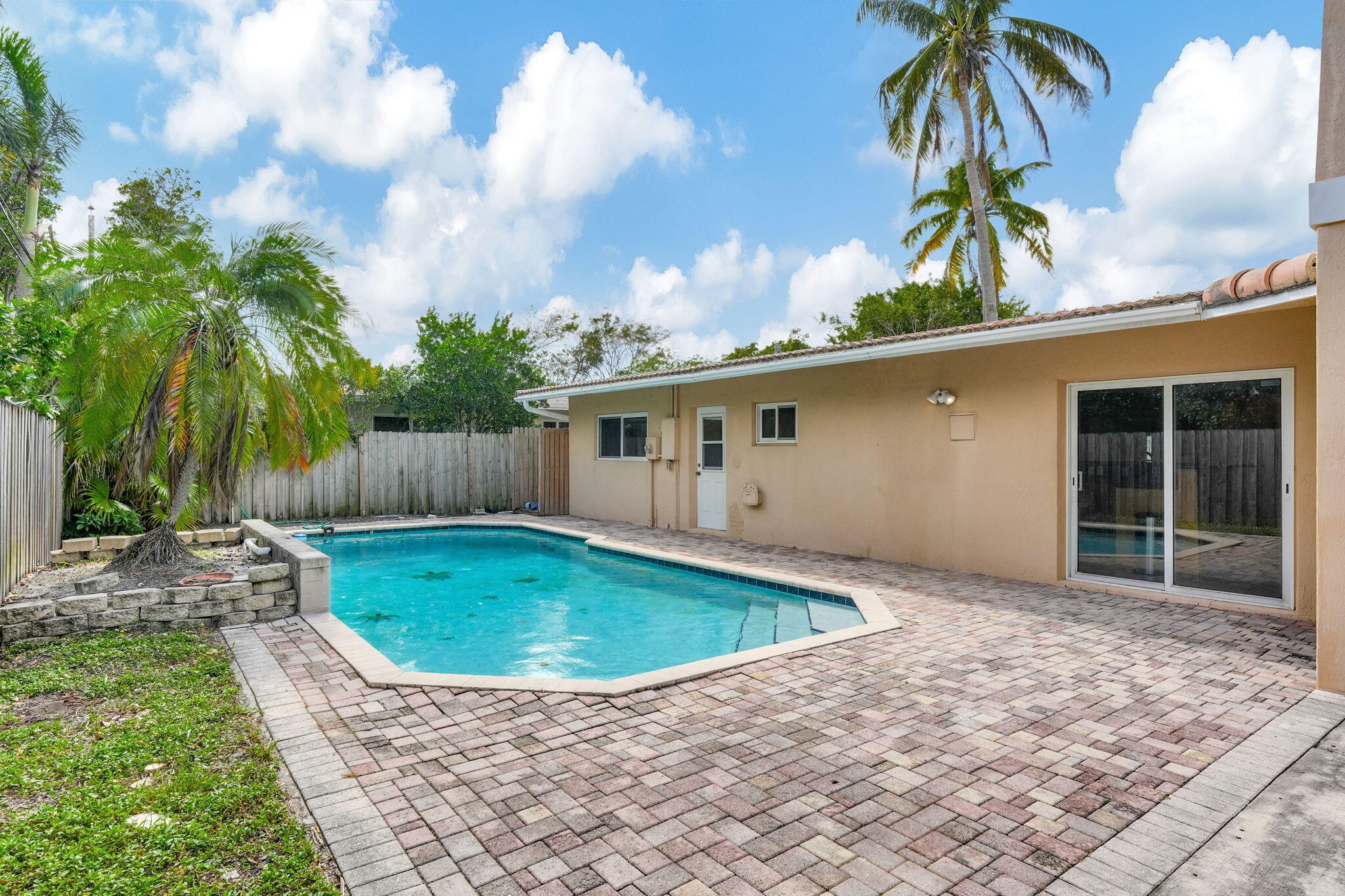 1300 Northeast 26th Avenue Pompano Beach, FL 33062 - Photo 1 of 68 a view of outdoor space yard and swimming pool