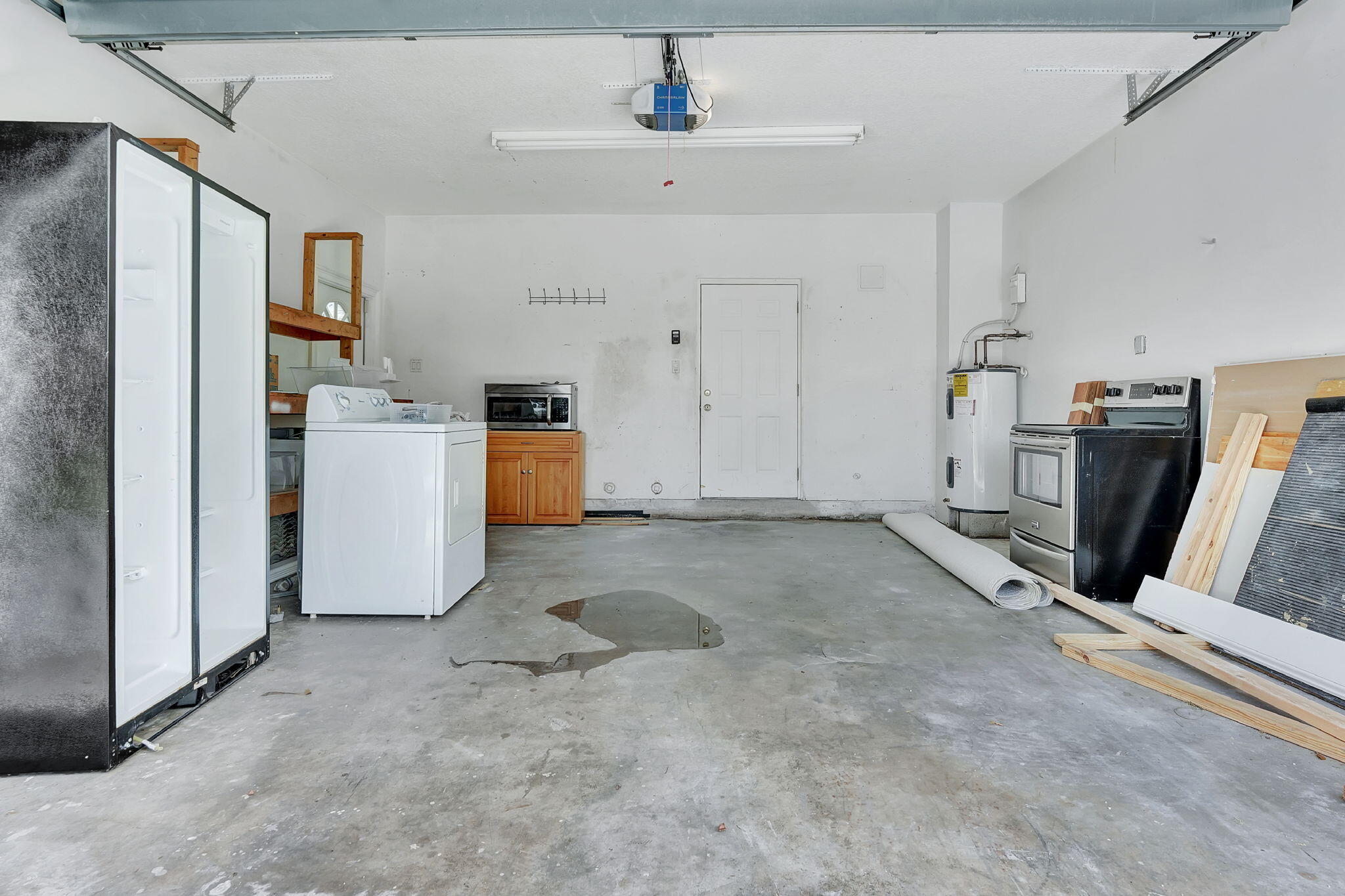 1300 Northeast 26th Avenue Pompano Beach, FL 33062 - Photo 22 of 68 a view of kitchen with refrigerator and microwave