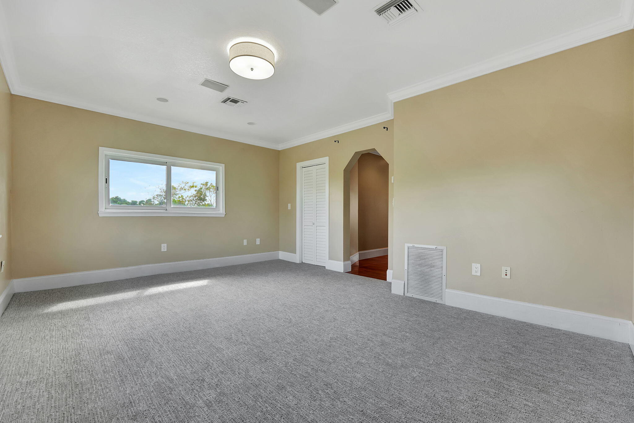 1300 Northeast 26th Avenue Pompano Beach, FL 33062 - Photo 25 of 68 a view of an empty room with a window