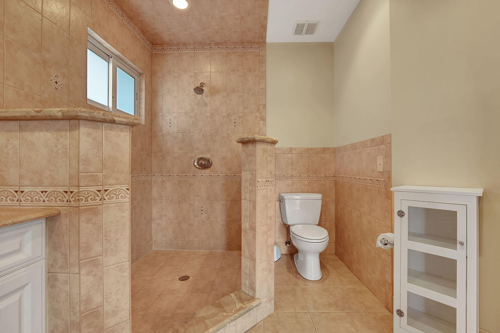 1300 Northeast 26th Avenue Pompano Beach, FL 33062 - Photo 29 of 68 a bathroom with a toilet and a shower