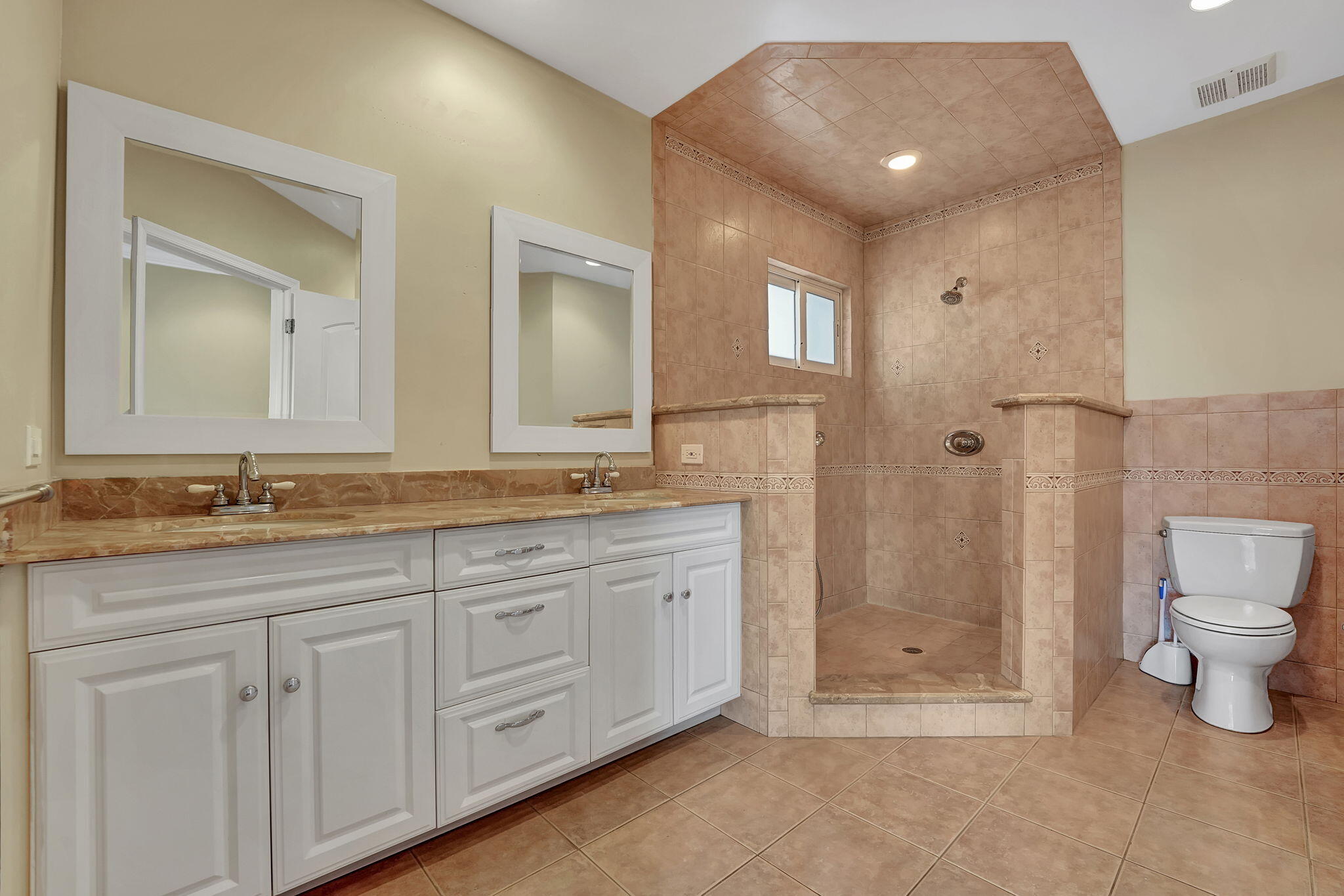 1300 Northeast 26th Avenue Pompano Beach, FL 33062 - Photo 30 of 68 a bathroom with a granite countertop sink mirror and toilet