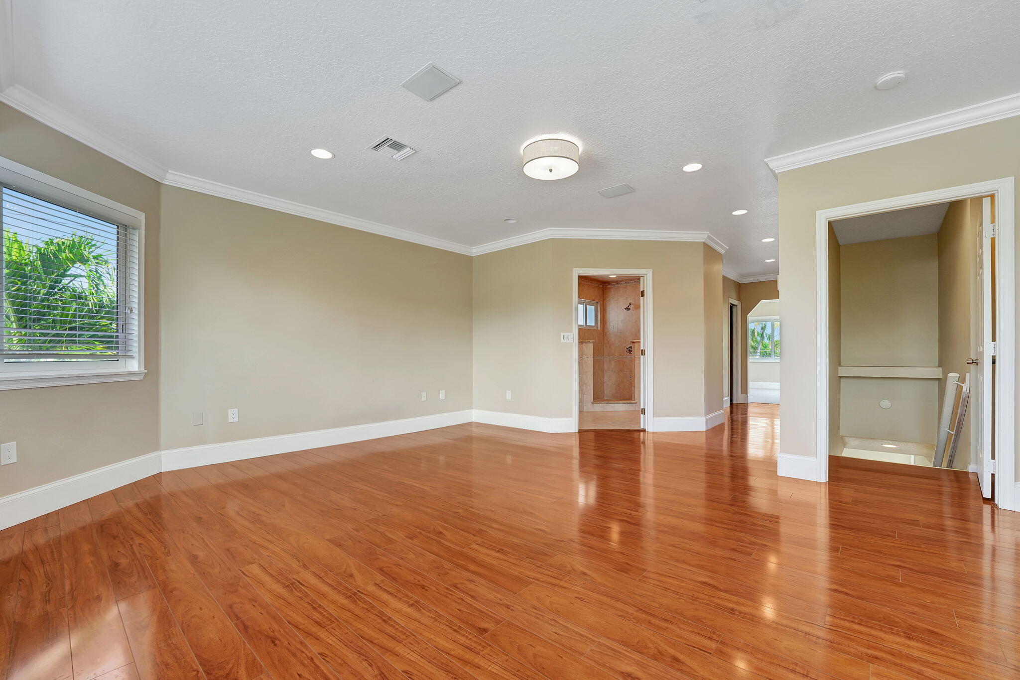 1300 Northeast 26th Avenue Pompano Beach, FL 33062 - Photo 31 of 68 an empty room with wooden floor and windows