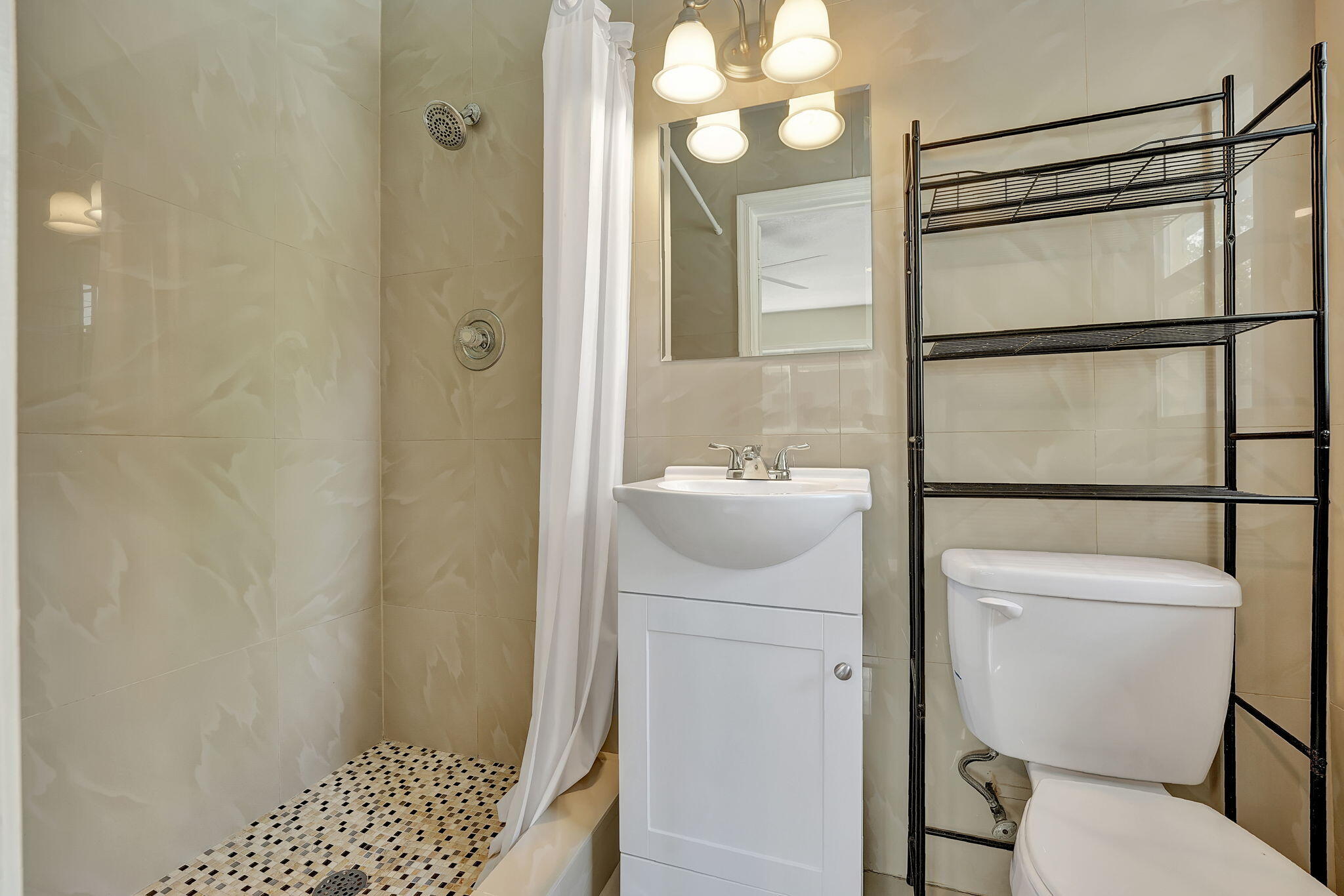 1300 Northeast 26th Avenue Pompano Beach, FL 33062 - Photo 37 of 68 a bathroom with a sink toilet and shower