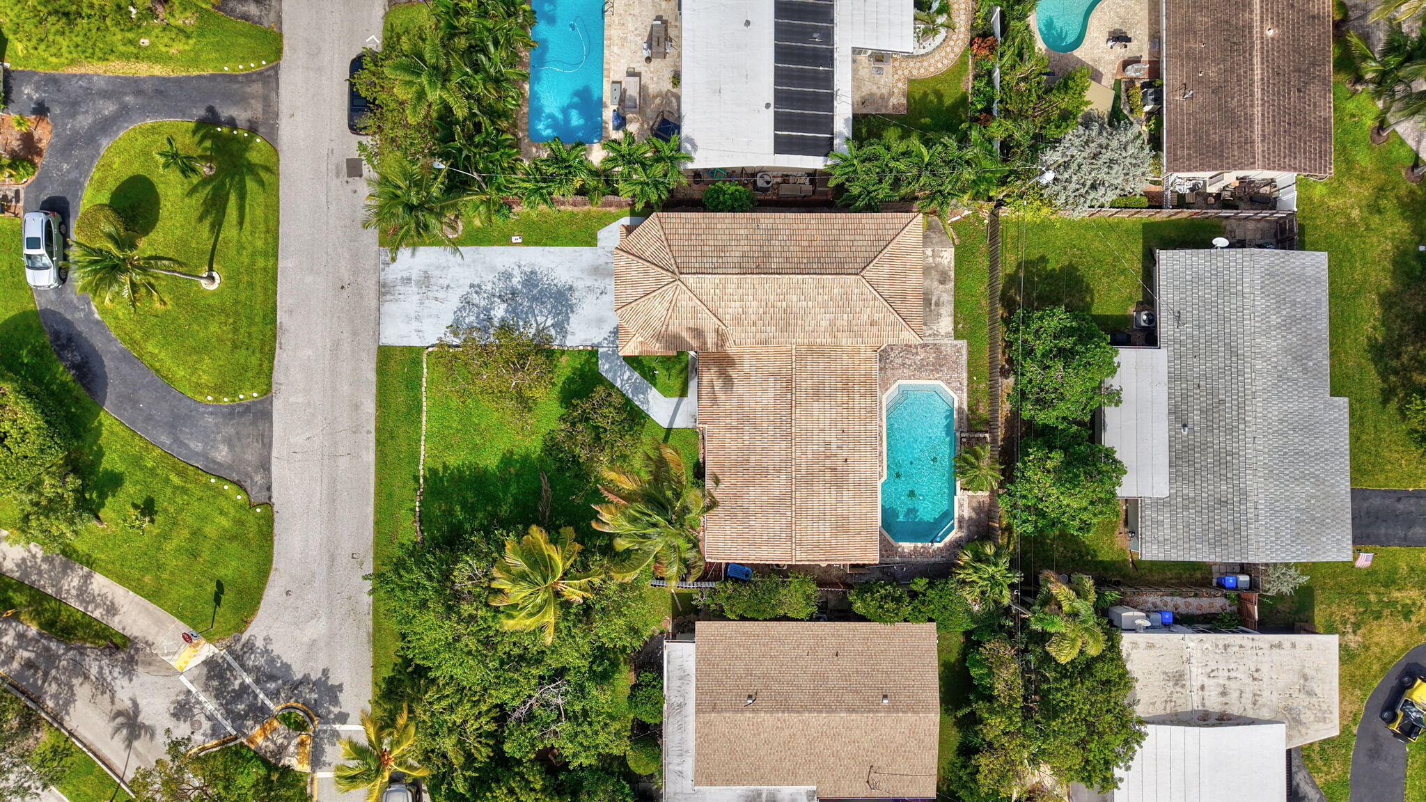 1300 Northeast 26th Avenue Pompano Beach, FL 33062 - Photo 4 of 68 an aerial view of a house with outdoor space