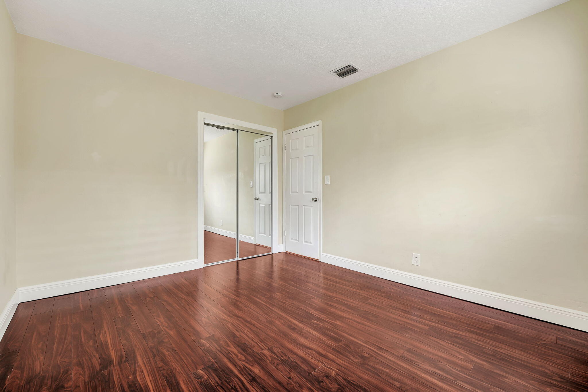 1300 Northeast 26th Avenue Pompano Beach, FL 33062 - Photo 41 of 68 a view of an empty room with wooden floor