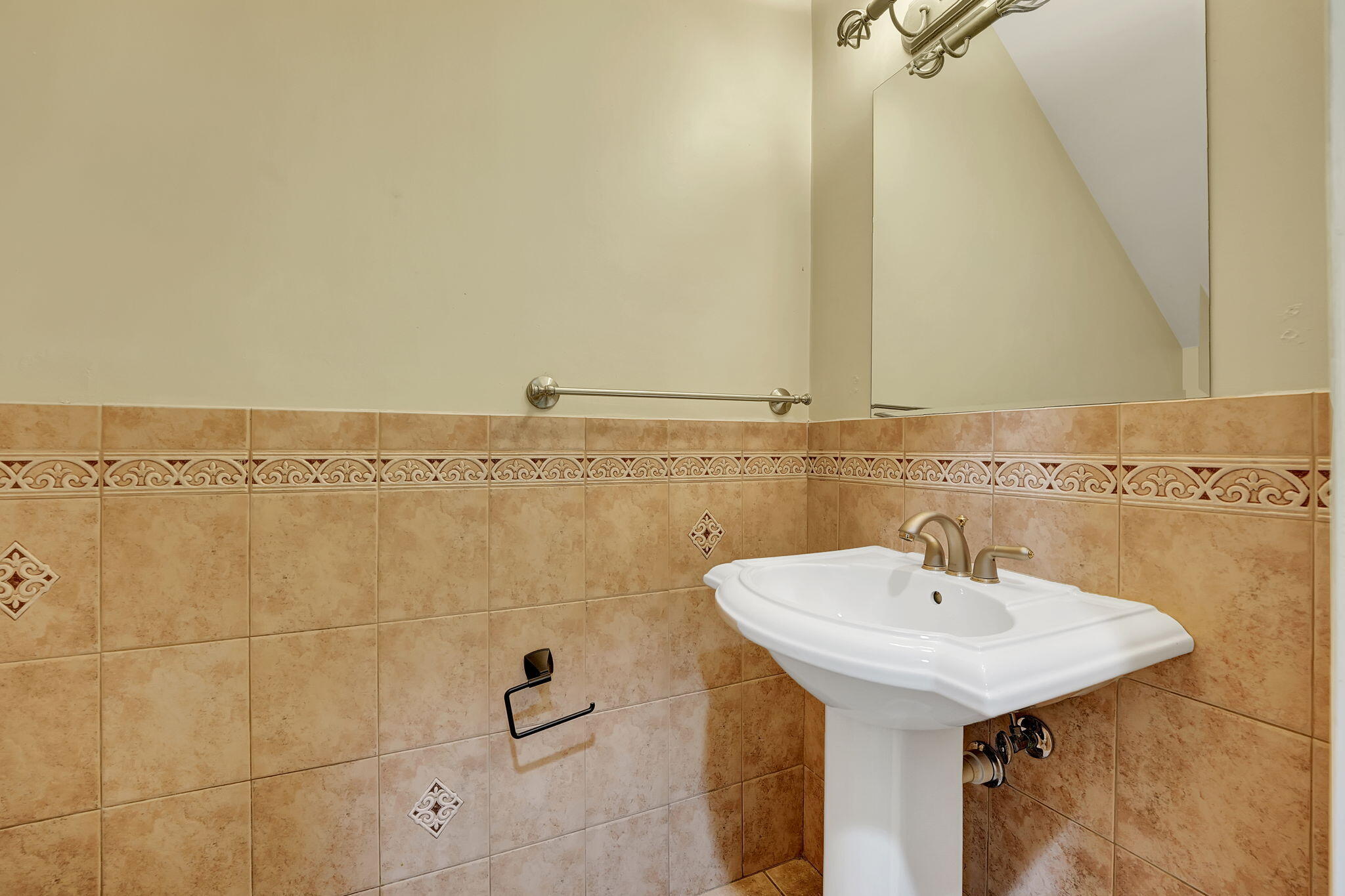 1300 Northeast 26th Avenue Pompano Beach, FL 33062 - Photo 48 of 68 a bathroom with a sink and a mirror