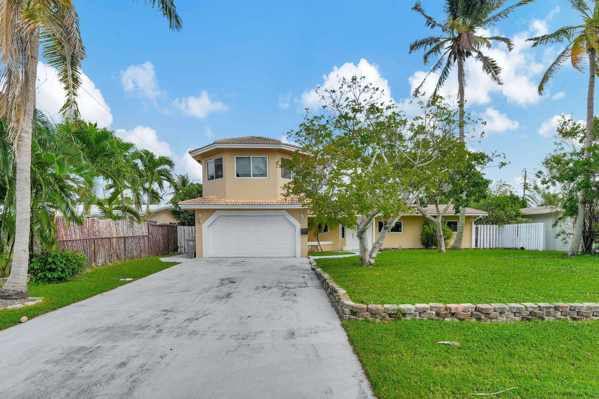 1300 Northeast 26th Avenue Pompano Beach, FL 33062 - Photo 57 of 68 a view of house with a yard and potted plants