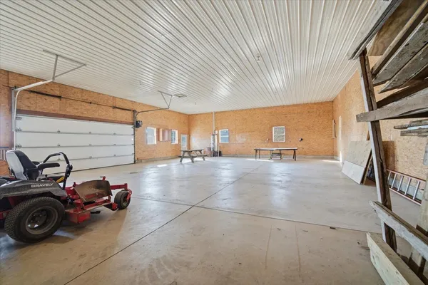 a view of a garage with parked cars