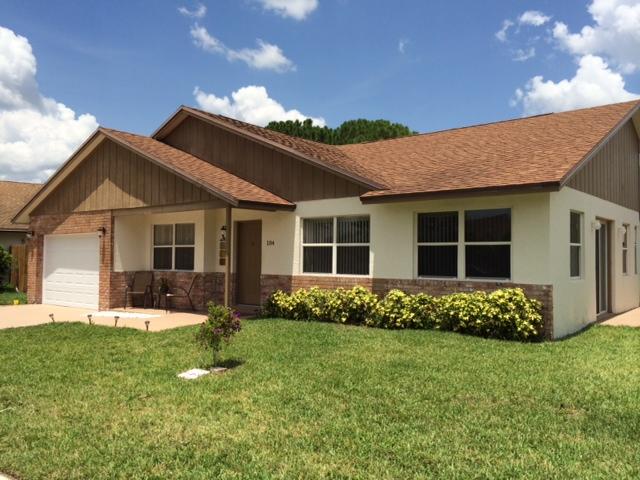 104 Raintree Trail Jupiter, FL 33458 - Photo 1 of 25 House Front