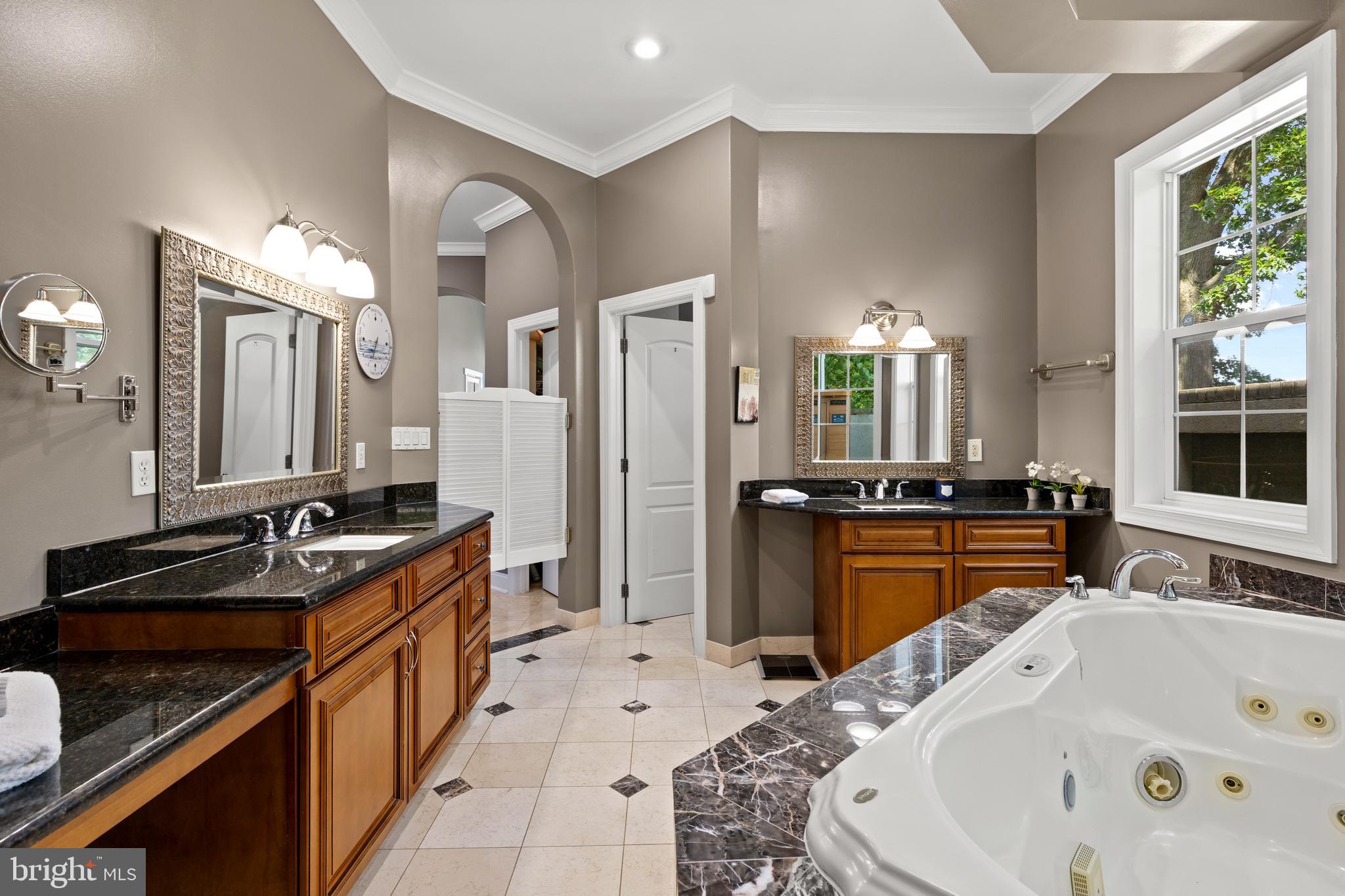 4819 Avery Road Shady Side, MD 20764 - Photo 12 of 44 a spacious bathroom with a sink double vanity