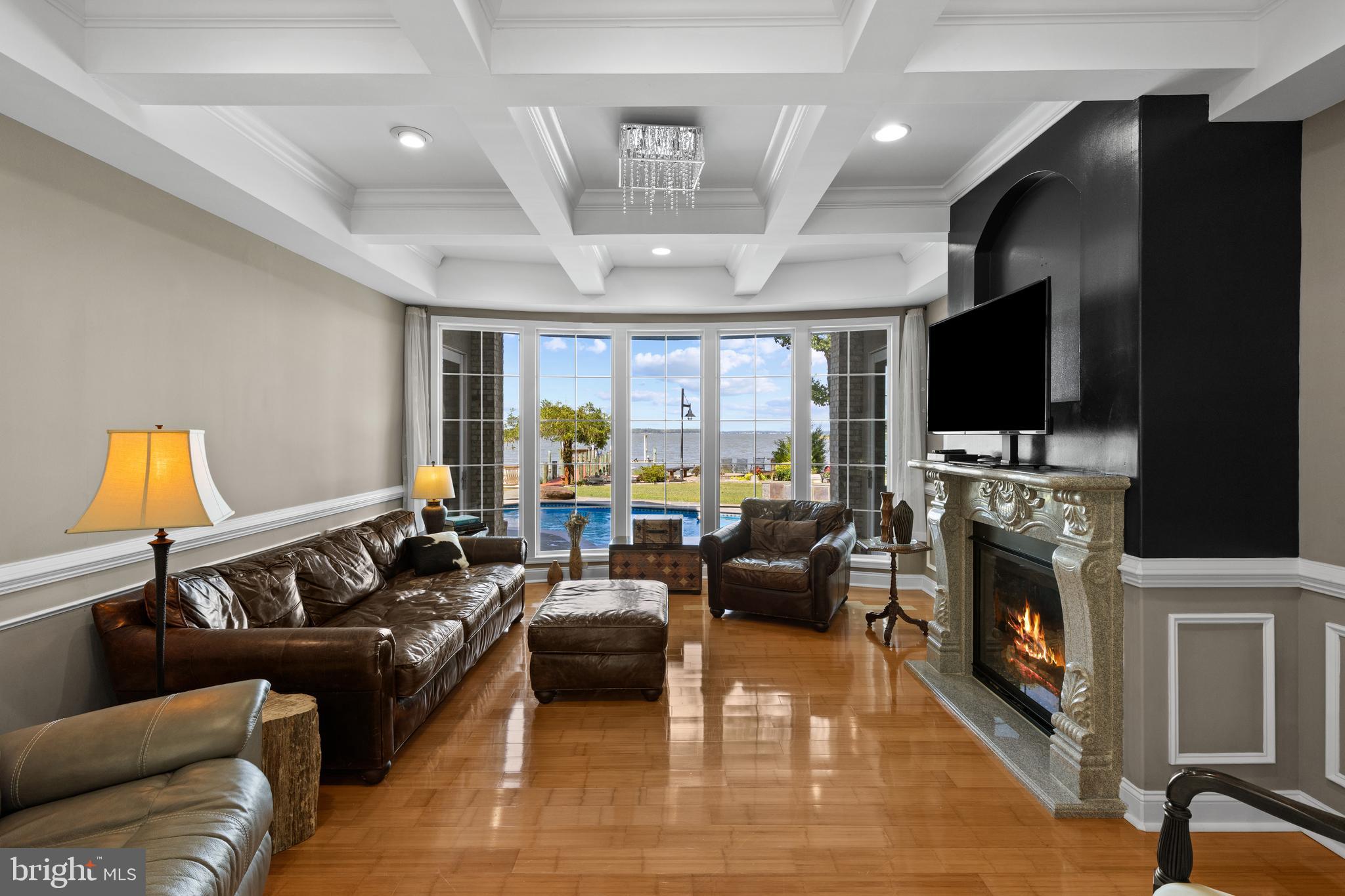 4819 Avery Road Shady Side, MD 20764 - Photo 14 of 44 a living room with furniture and a flat screen tv