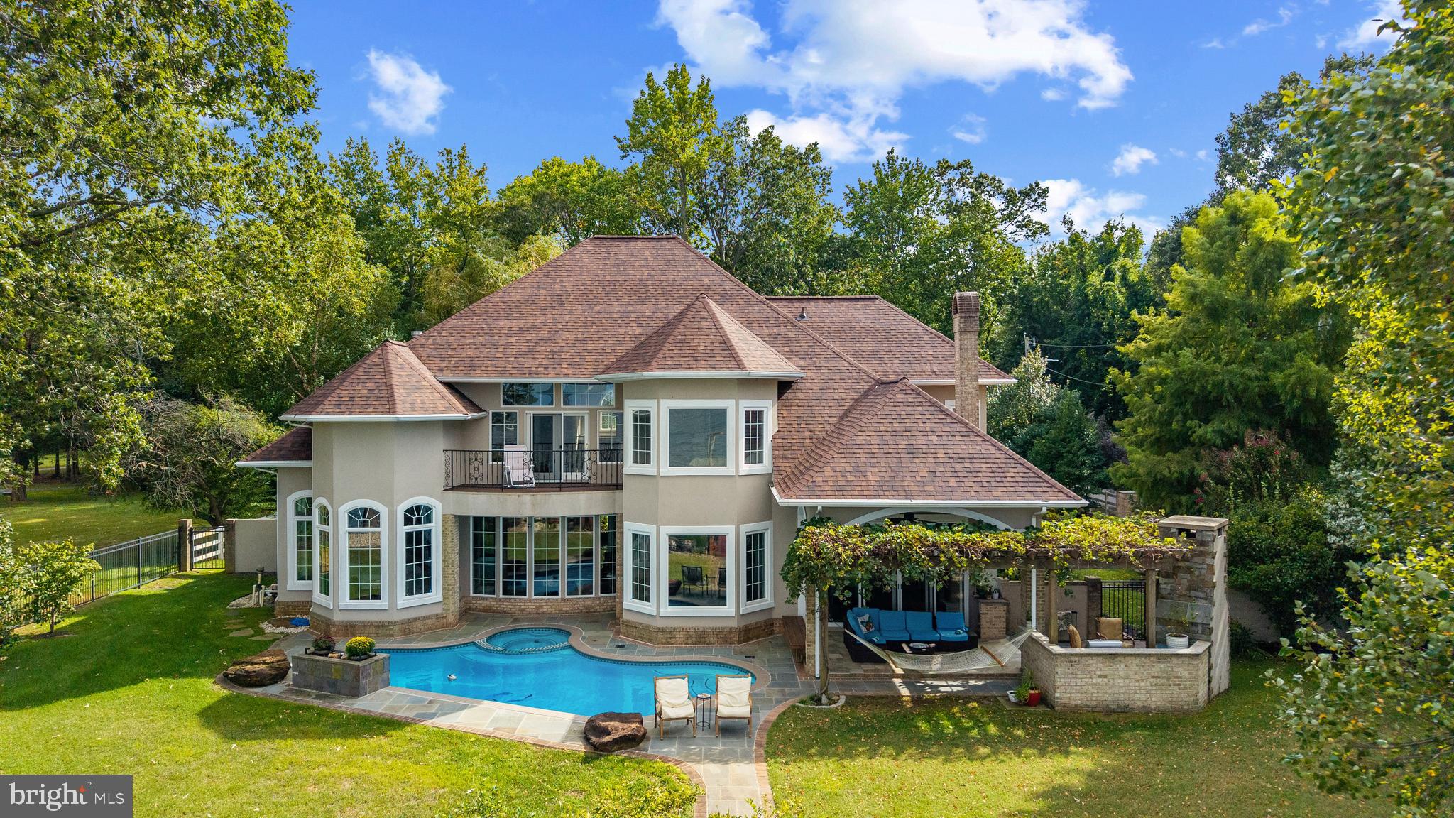 4819 Avery Road Shady Side, MD 20764 - Photo 2 of 44 a aerial view of a house with yard swimming pool and outdoor seating