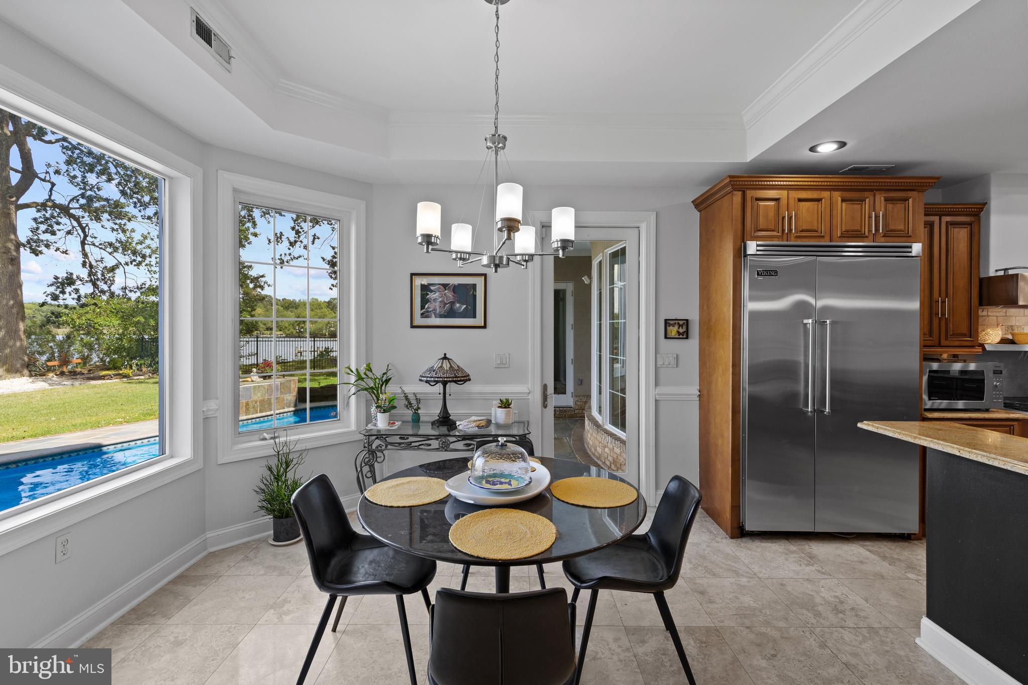 4819 Avery Road Shady Side, MD 20764 - Photo 20 of 44 a view of a dining room with furniture window and outside view