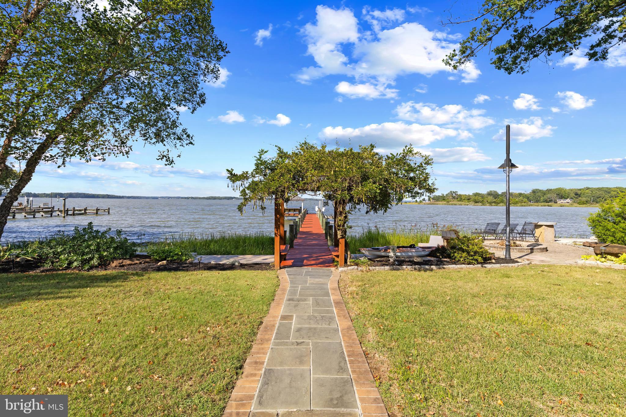 4819 Avery Road Shady Side, MD 20764 - Photo 23 of 44 a view of a yard with an outdoor space