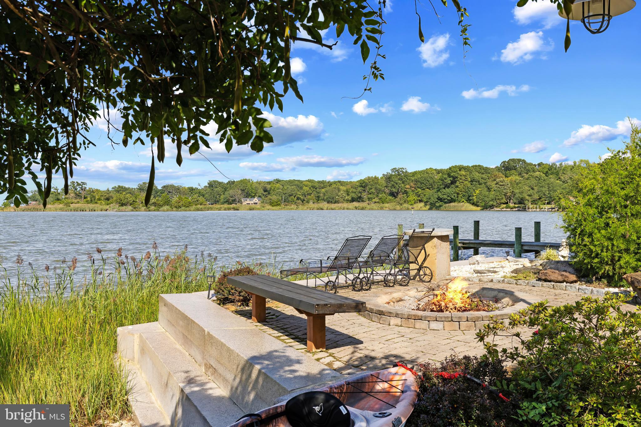 4819 Avery Road Shady Side, MD 20764 - Photo 26 of 44 a view of a lake with couches and city view