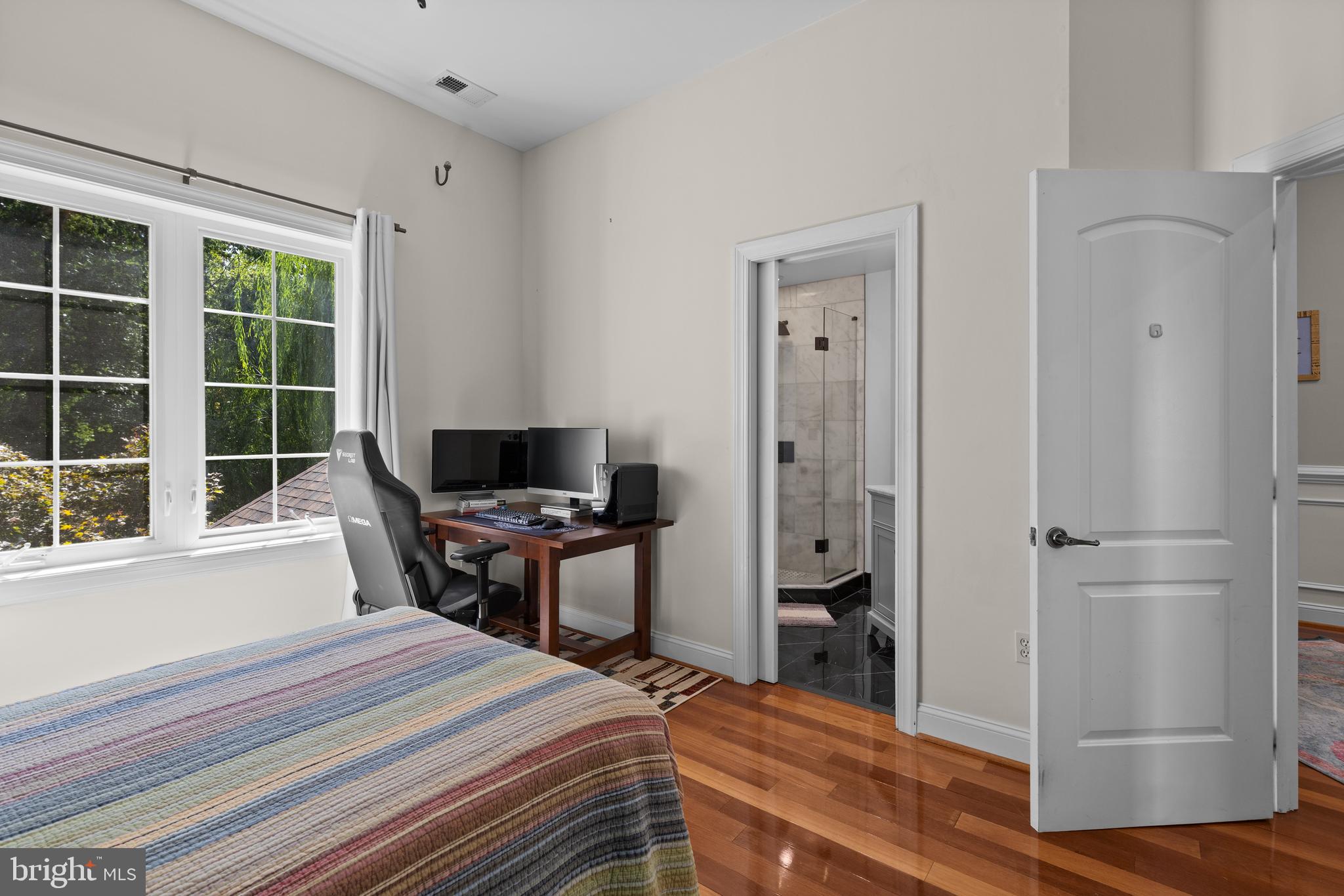 4819 Avery Road Shady Side, MD 20764 - Photo 29 of 44 a bedroom with a bed and a window