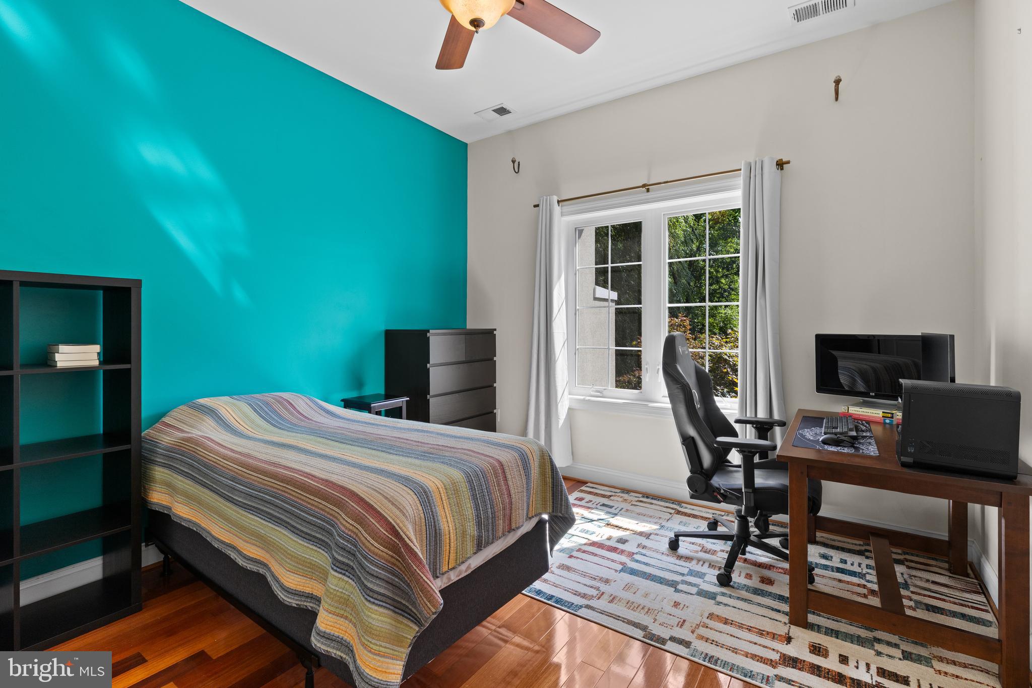 4819 Avery Road Shady Side, MD 20764 - Photo 30 of 44 a bedroom with a bed and a window