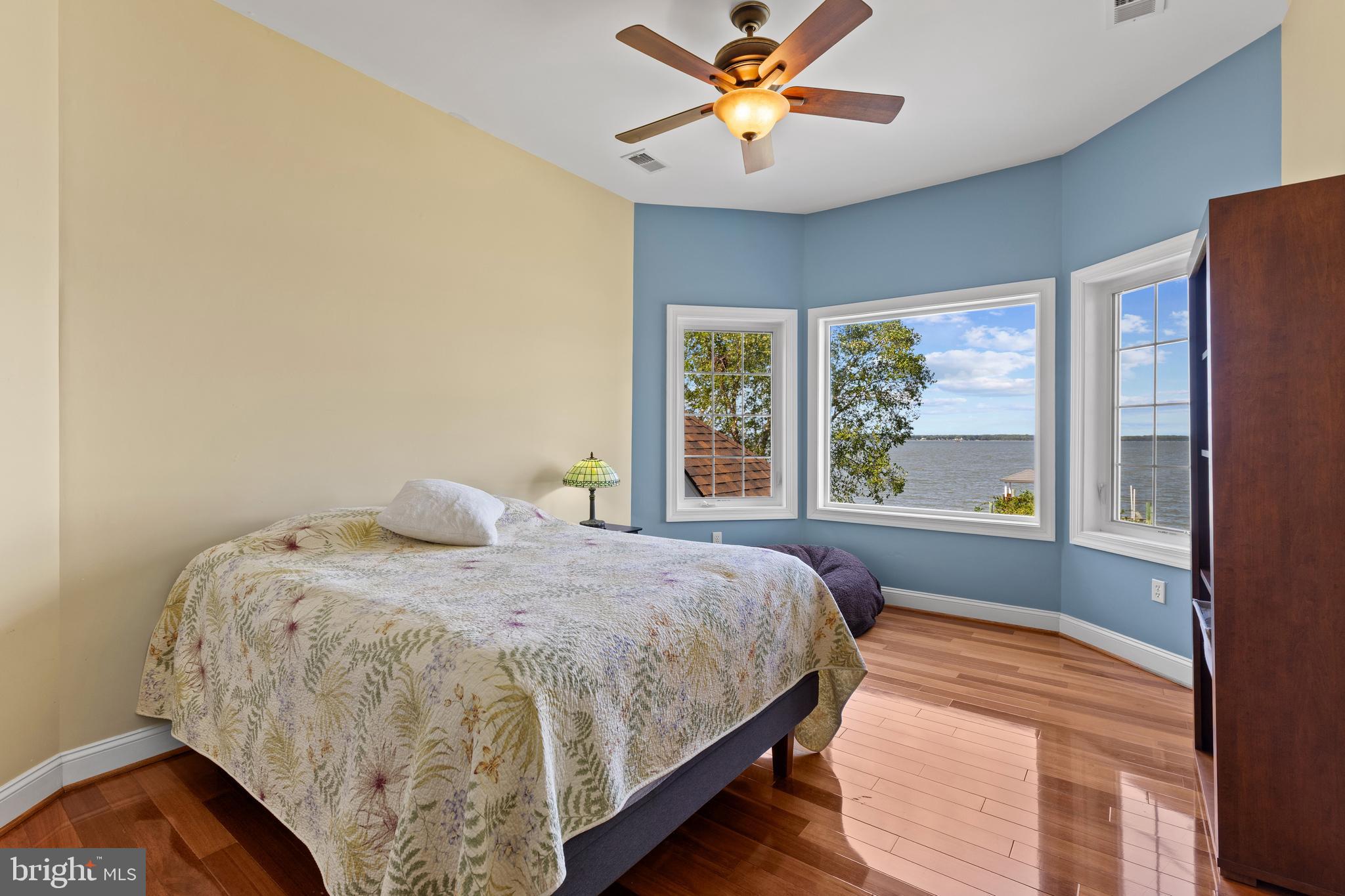 4819 Avery Road Shady Side, MD 20764 - Photo 33 of 44 a bedroom with a bed and window