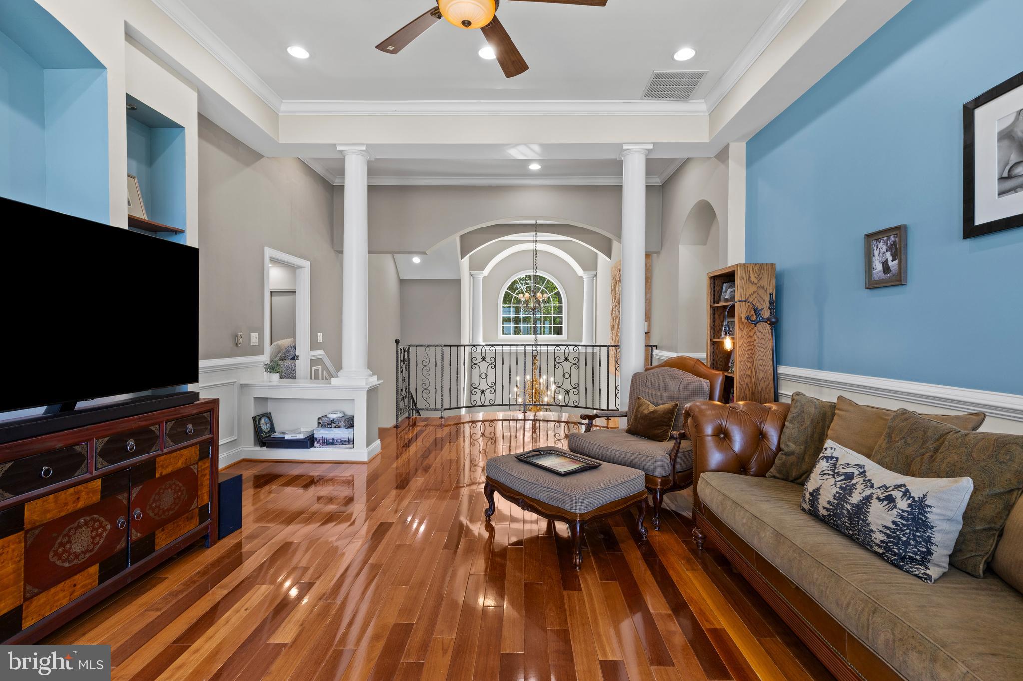 4819 Avery Road Shady Side, MD 20764 - Photo 36 of 44 a living room with furniture and a flat screen tv