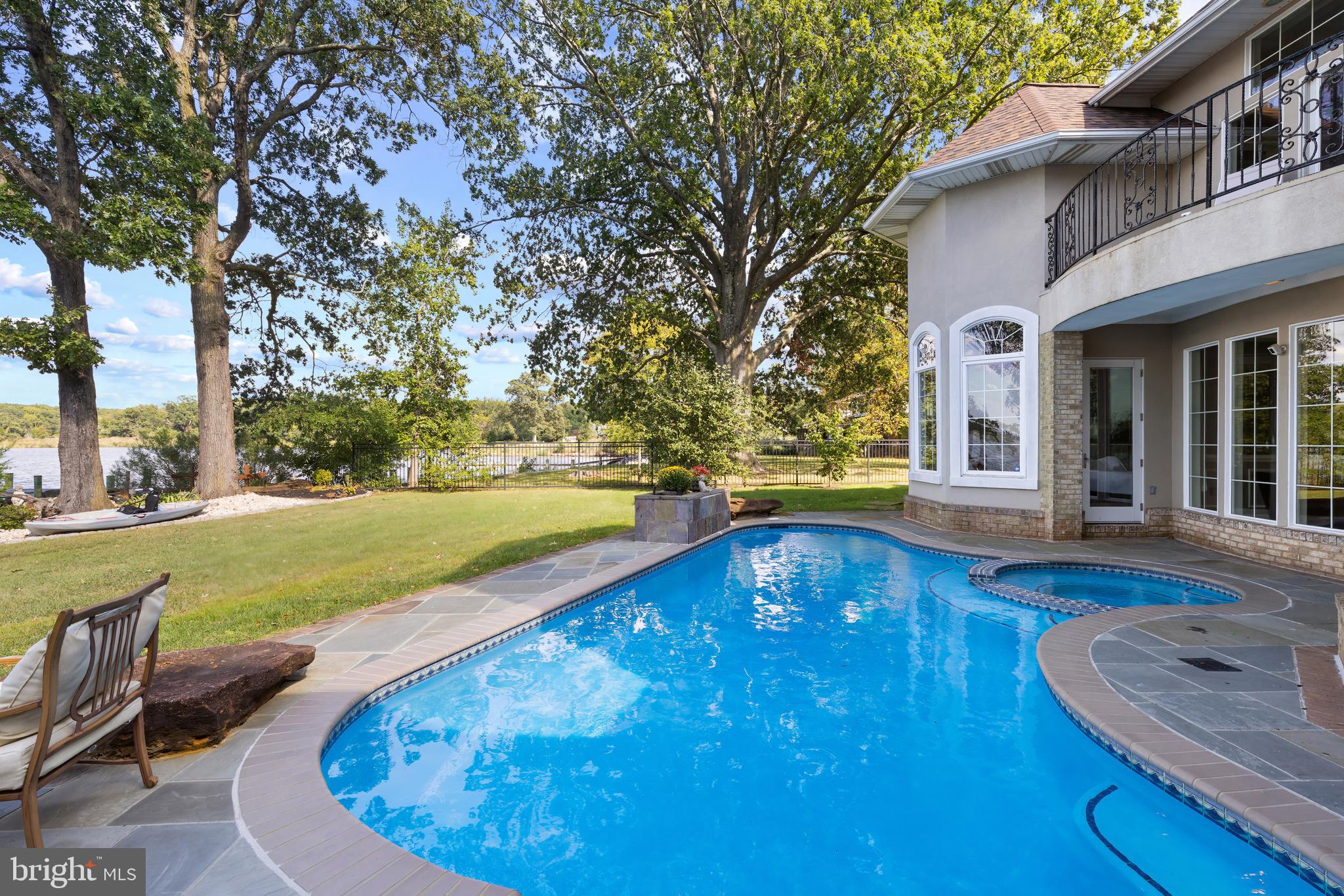 4819 Avery Road Shady Side, MD 20764 - Photo 4 of 44 a view of a house with swimming pool and sitting area