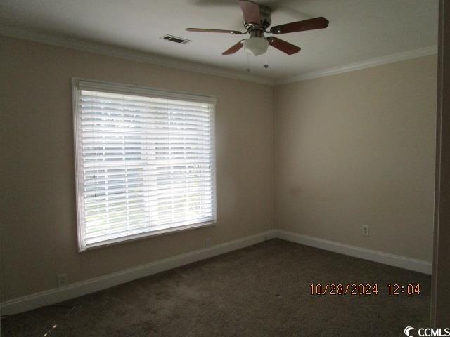 321 Heritage Road Conway, SC 29527 - Photo 11 of 15 Carpeted spare room featuring ornamental molding,