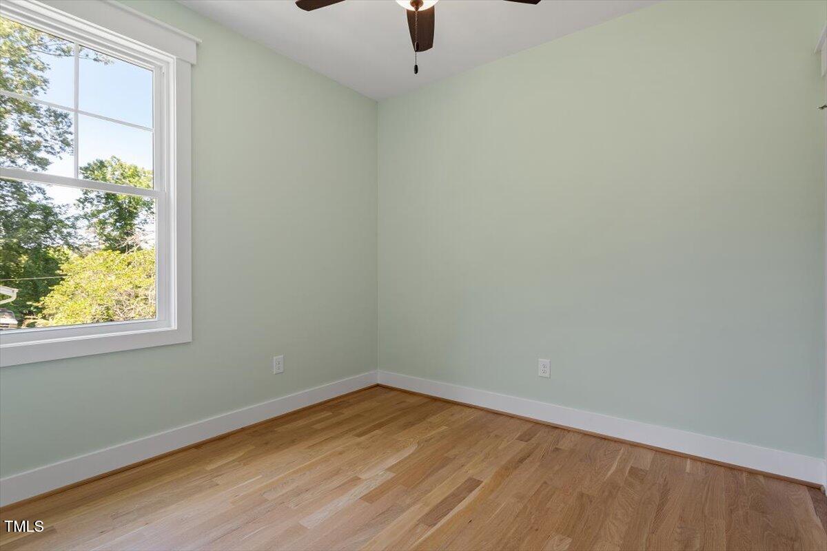 3934 Old Chapel Hill Road Durham, NC 27707 - Photo 38 of 47 an empty room with a window