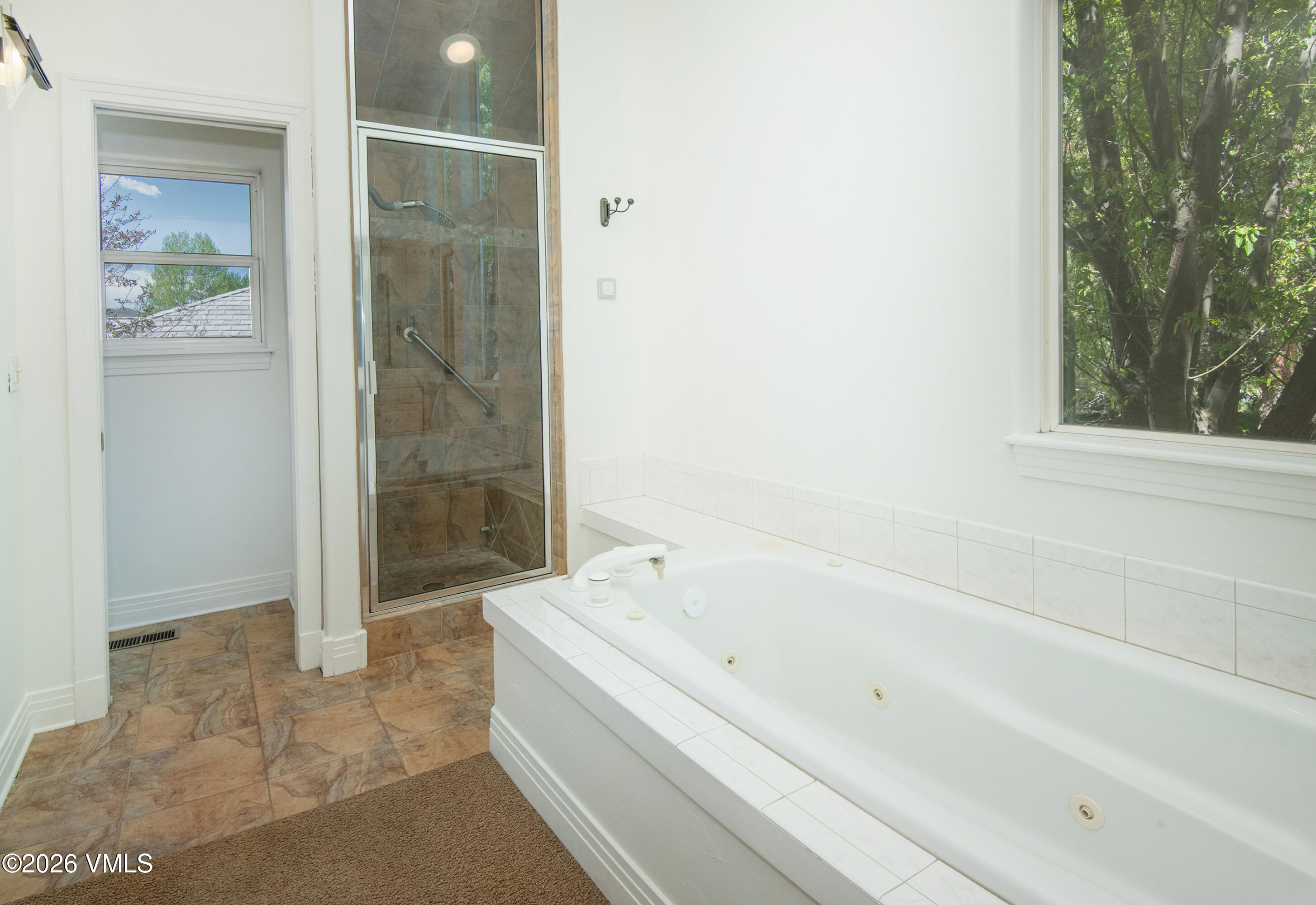 471 Rawhide Road Edwards, CO 81632 - Photo 21 of 51 a bathroom with a bathtub and shower
