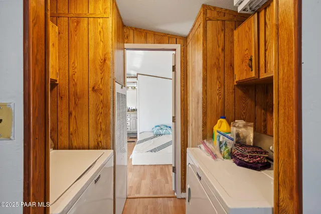 a bathroom with a tub and shower