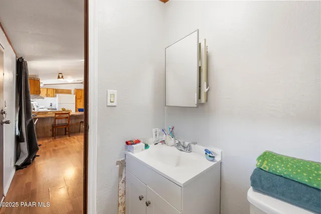 a bathroom with a shower and a tub
