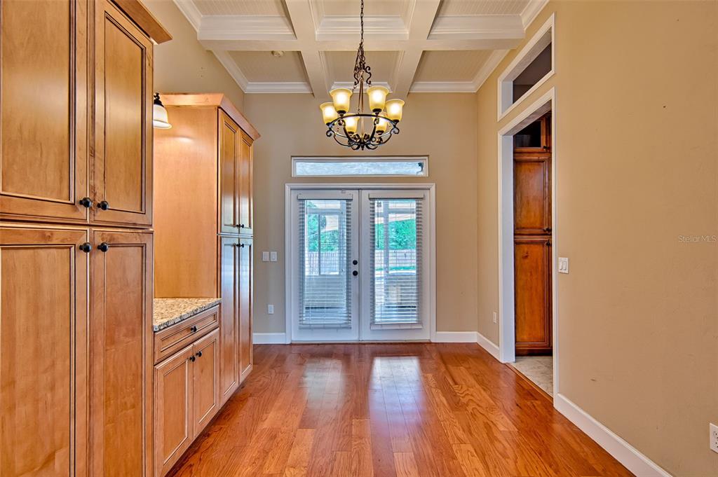 7546 Southwest 90th Drive Gainesville, FL 32608 - Photo 14 of 46 a view of an entryway with wooden floor