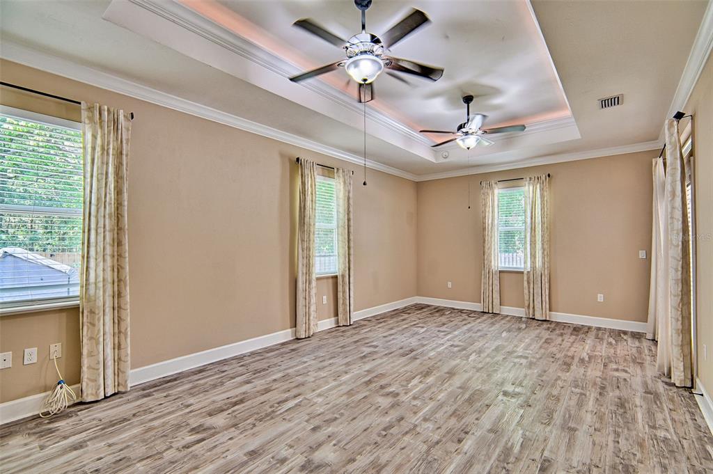 7546 Southwest 90th Drive Gainesville, FL 32608 - Photo 16 of 46 a view of an empty room with a window