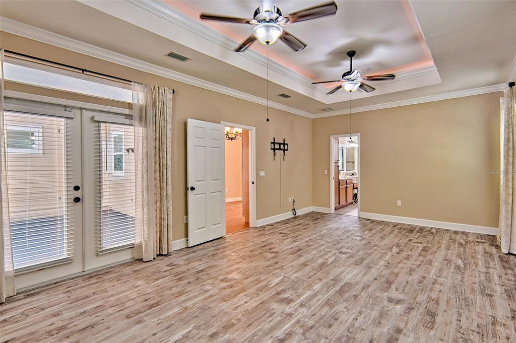 7546 Southwest 90th Drive Gainesville, FL 32608 - Photo 17 of 46 wooden floor in an empty room with a window