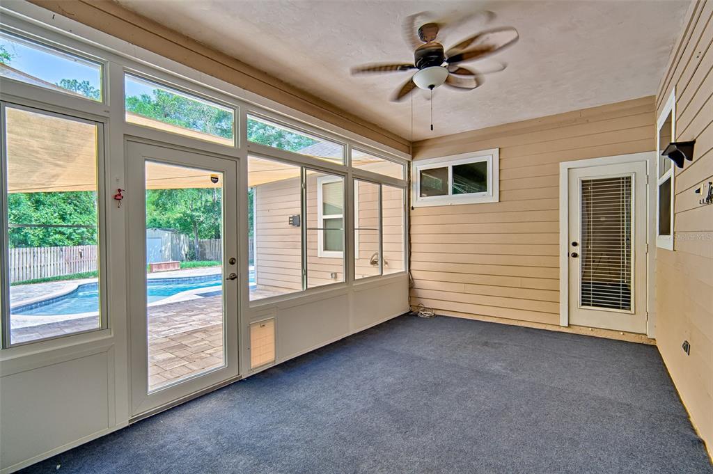 7546 Southwest 90th Drive Gainesville, FL 32608 - Photo 28 of 46 a view of an empty room with a window