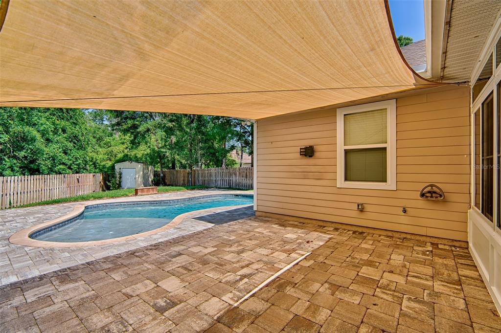 7546 Southwest 90th Drive Gainesville, FL 32608 - Photo 31 of 46 a backyard of a house