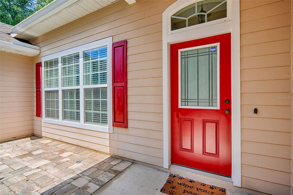 7546 Southwest 90th Drive Gainesville, FL 32608 - Photo 45 of 46 a view of a red door of the house