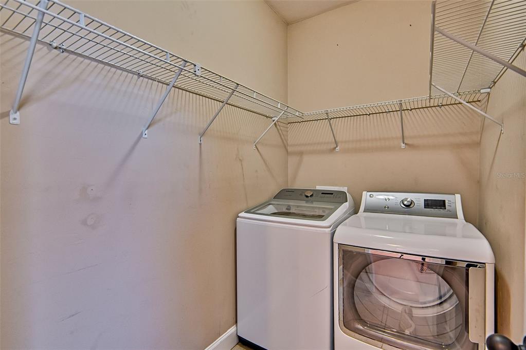 7546 Southwest 90th Drive Gainesville, FL 32608 - Photo 46 of 46 a utility room with dryer and washer