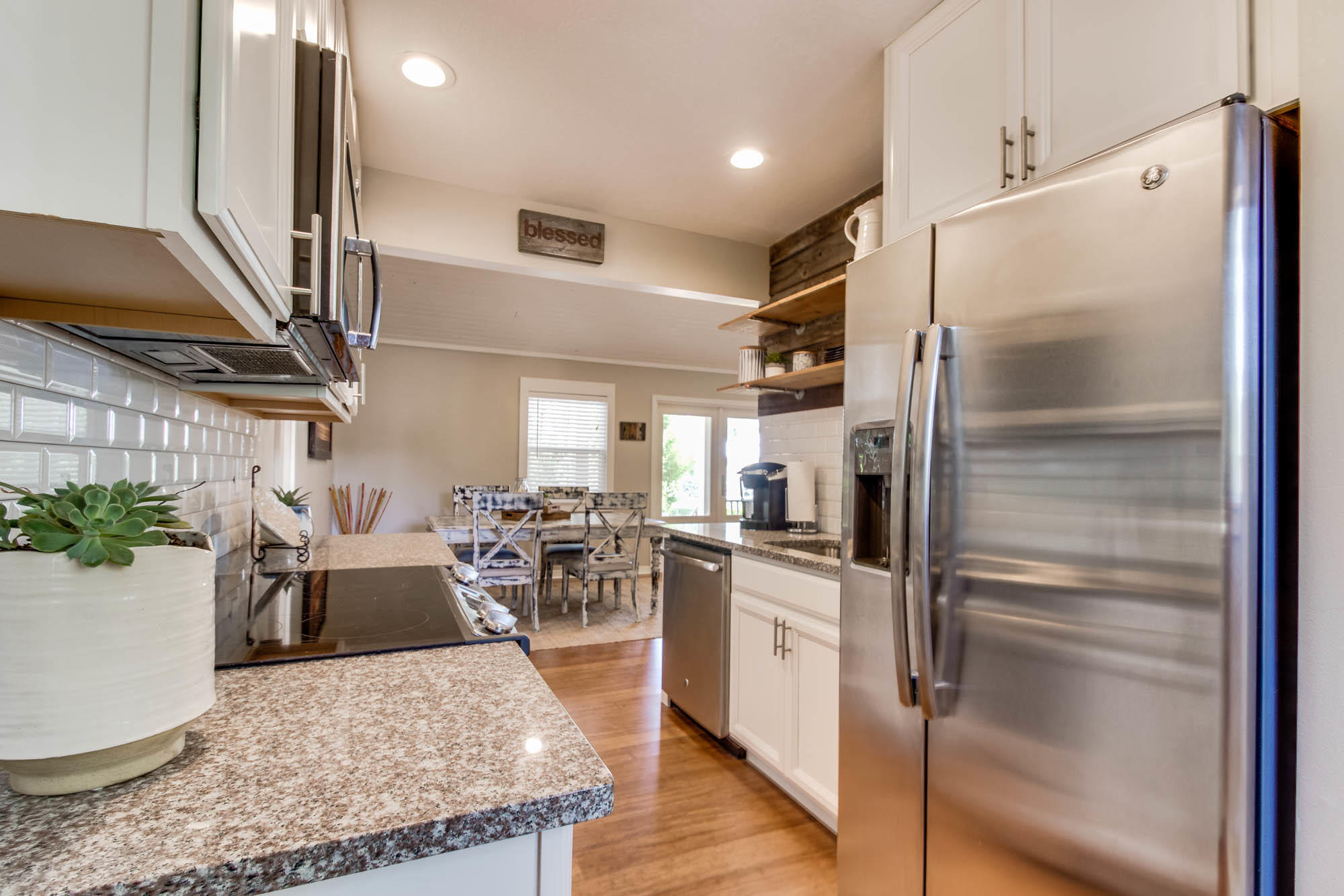 46 Cypress Pond Road Santa Rosa Beach, FL 32459 - Photo 15 of 36 a kitchen with stainless steel appliances granite countertop a refrigerator a oven and a sink