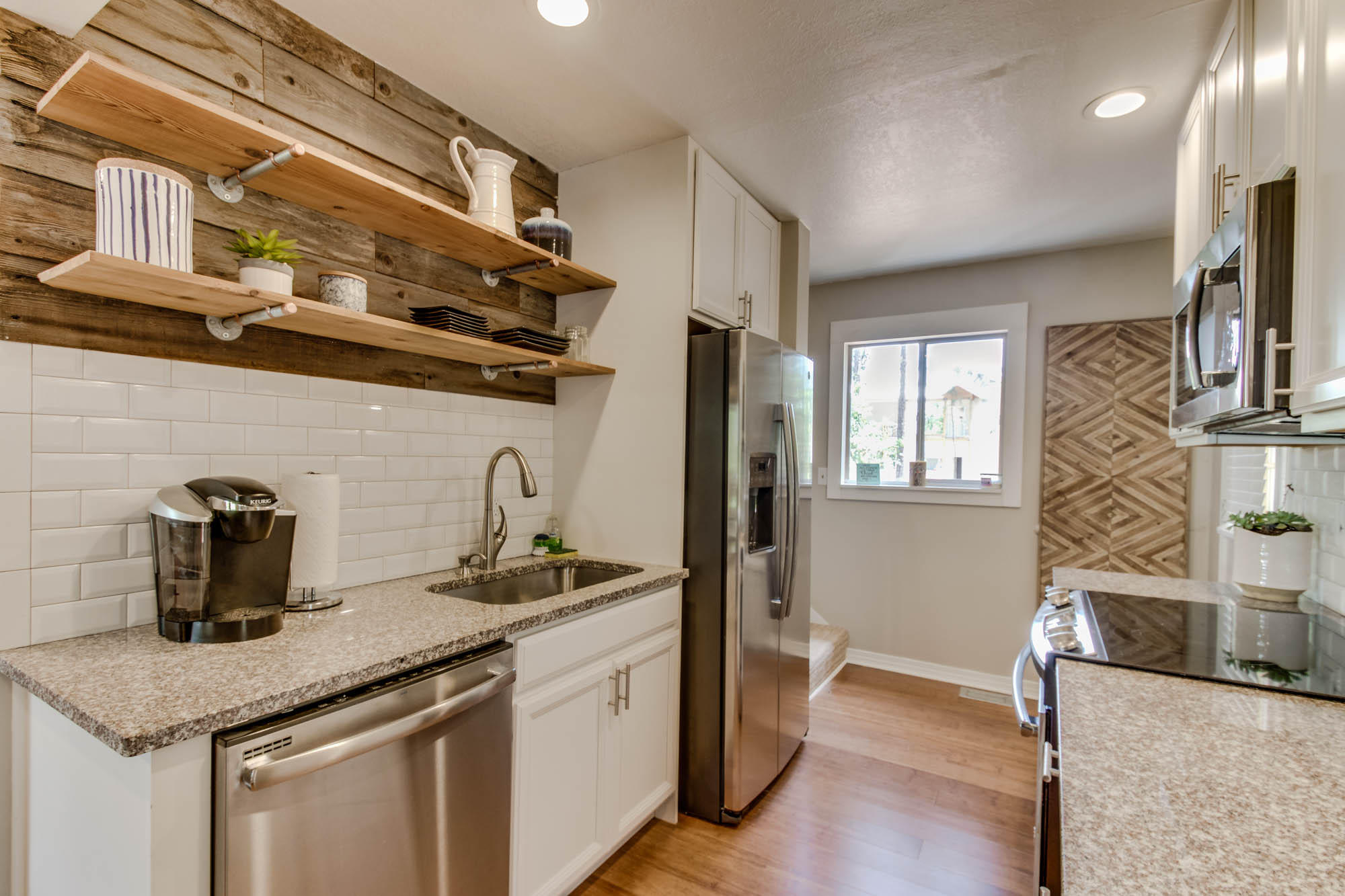 46 Cypress Pond Road Santa Rosa Beach, FL 32459 - Photo 16 of 36 a kitchen with stainless steel appliances granite countertop a sink stove and refrigerator