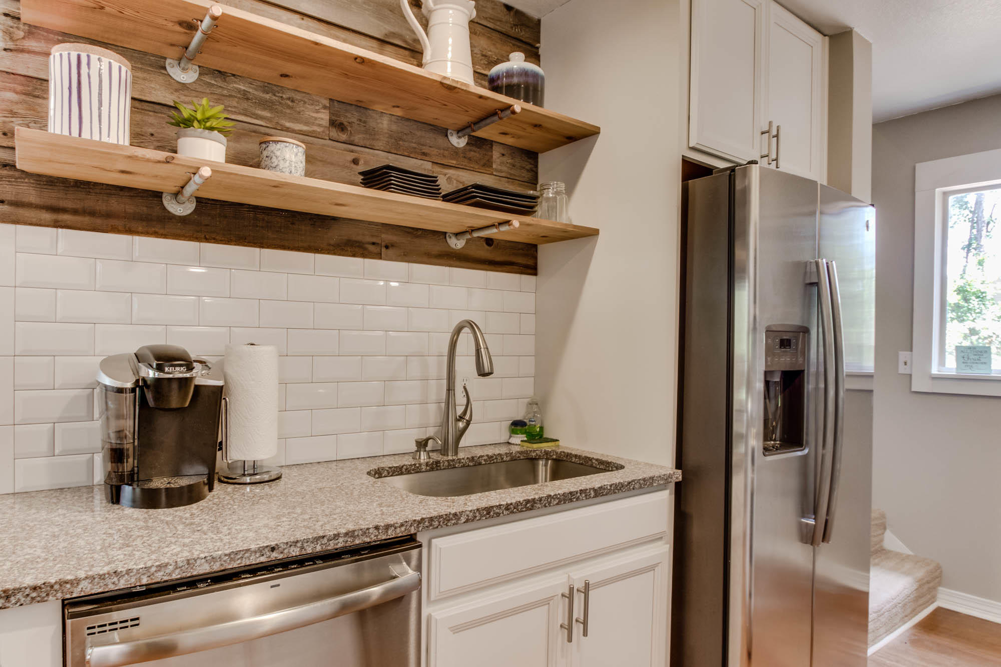 46 Cypress Pond Road Santa Rosa Beach, FL 32459 - Photo 17 of 36 a kitchen with a refrigerator and a sink