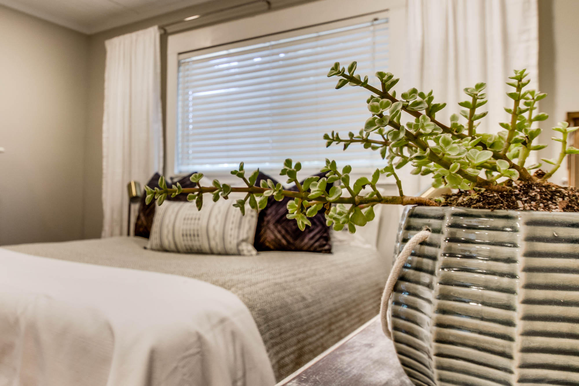 46 Cypress Pond Road Santa Rosa Beach, FL 32459 - Photo 22 of 36 a bedroom with a bed and a chair