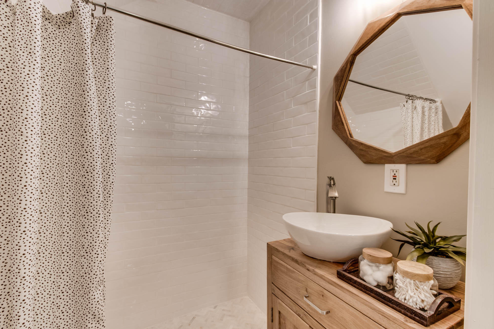 46 Cypress Pond Road Santa Rosa Beach, FL 32459 - Photo 24 of 36 a bathroom with a granite countertop sink a mirror and shower