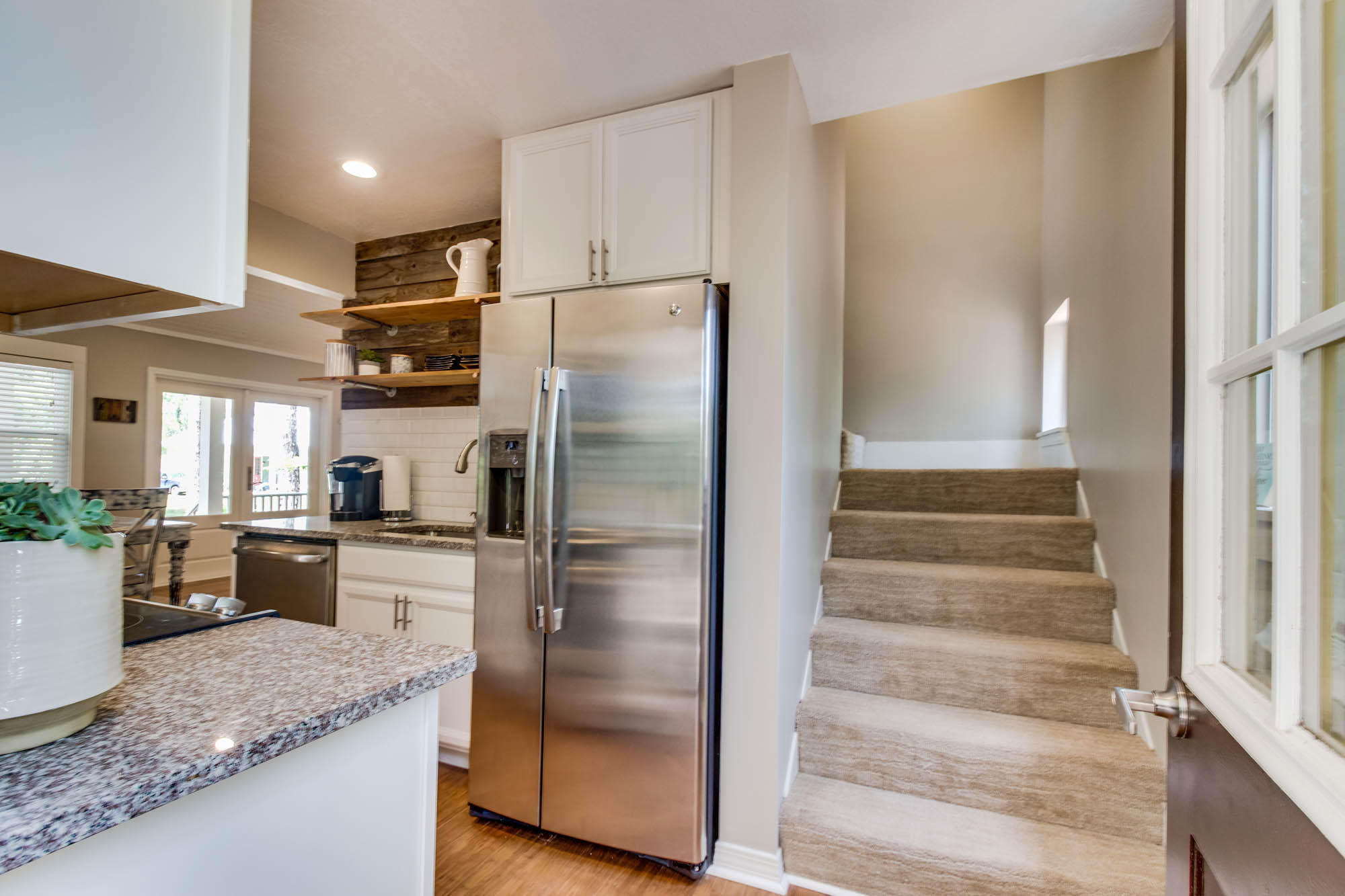 46 Cypress Pond Road Santa Rosa Beach, FL 32459 - Photo 26 of 36 a kitchen with granite countertop a refrigerator and a sink