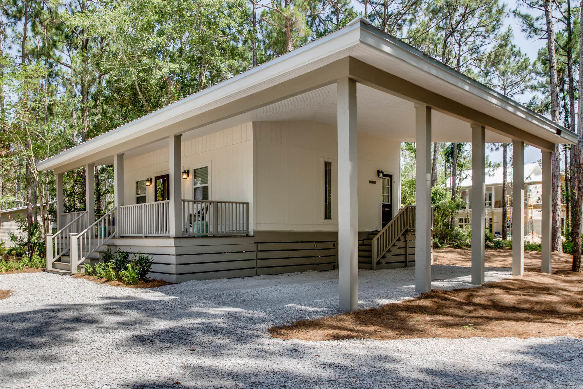 46 Cypress Pond Road Santa Rosa Beach, FL 32459 - Photo 33 of 36 a front view of a house with a garden