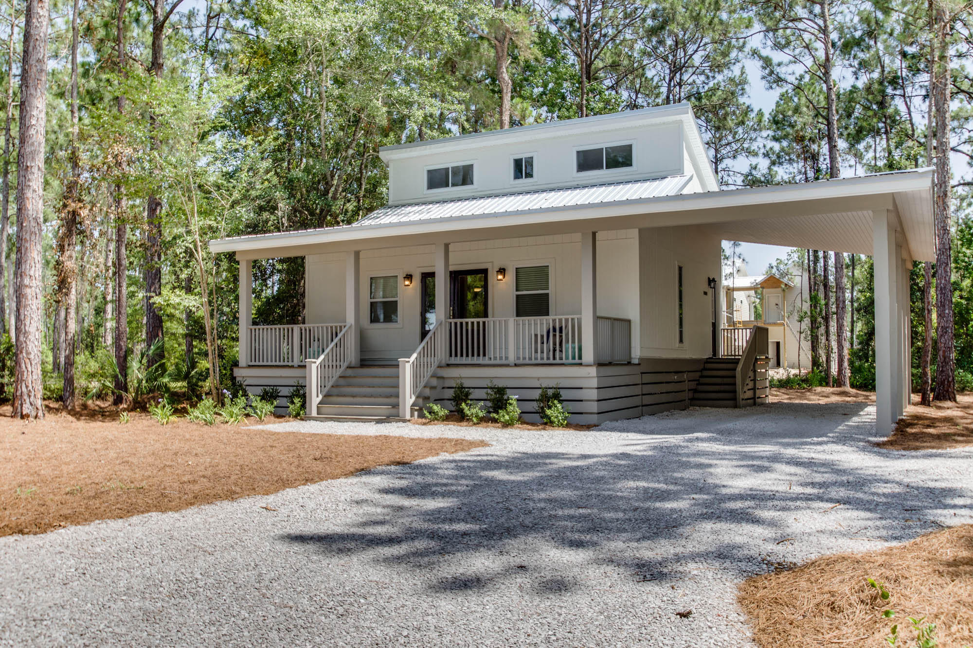 46 Cypress Pond Road Santa Rosa Beach, FL 32459 - Photo 34 of 36 a front view of a house with garden