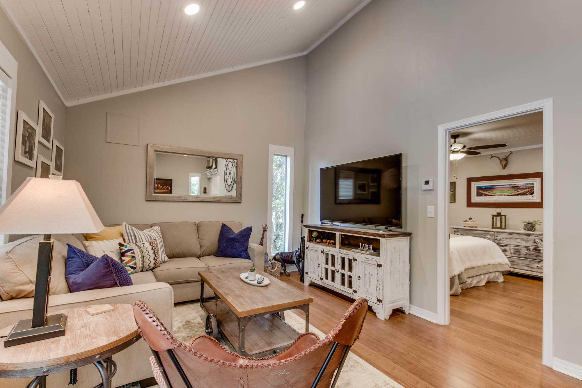 46 Cypress Pond Road Santa Rosa Beach, FL 32459 - Photo 10 of 36 a living room with furniture and a flat screen tv